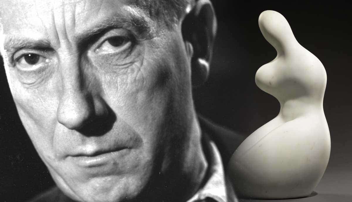 Portrait of Jean Arp with sculpture