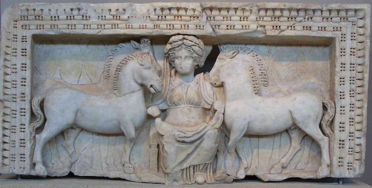 Stone carving of Epona with two horses