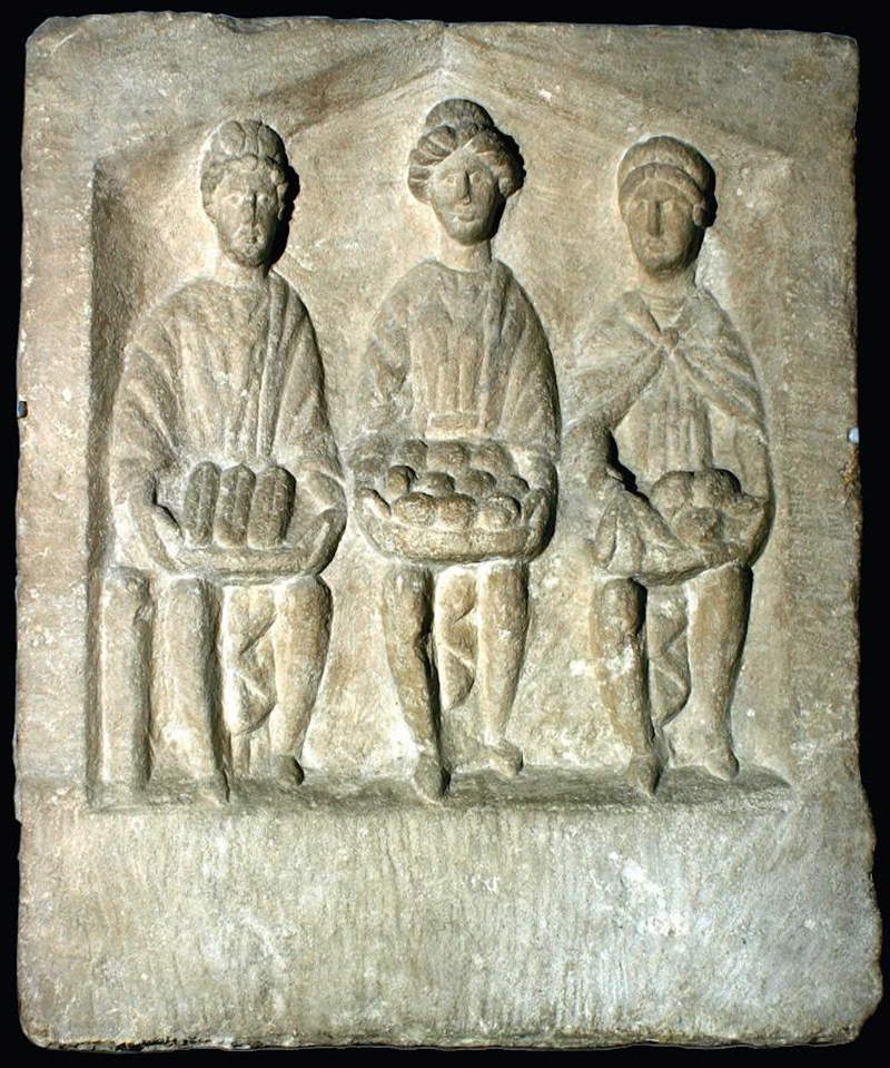 Triplicate Mother Goddesses carrying baskets of food