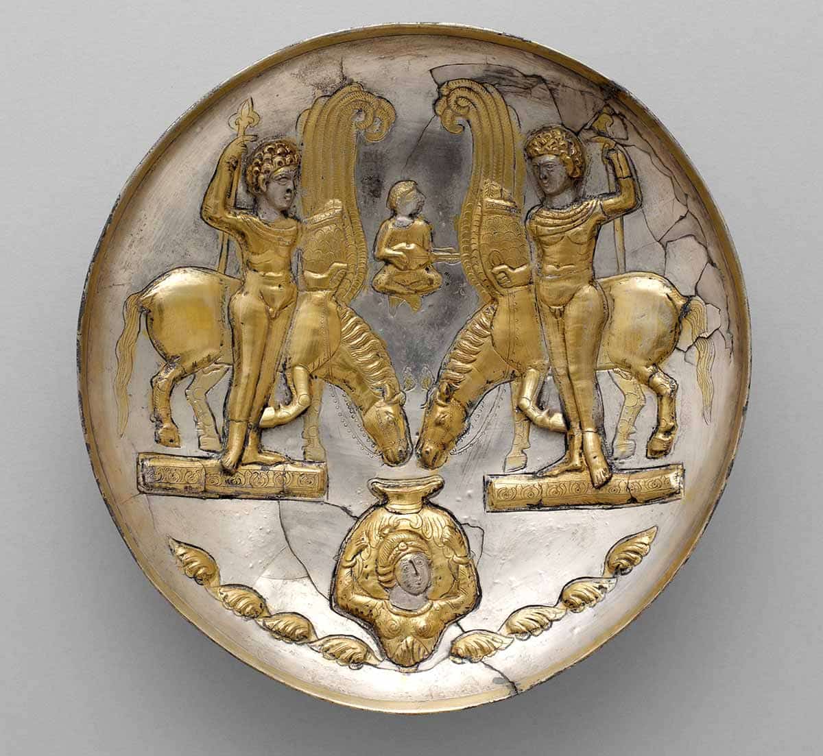 Plate with youths and horses