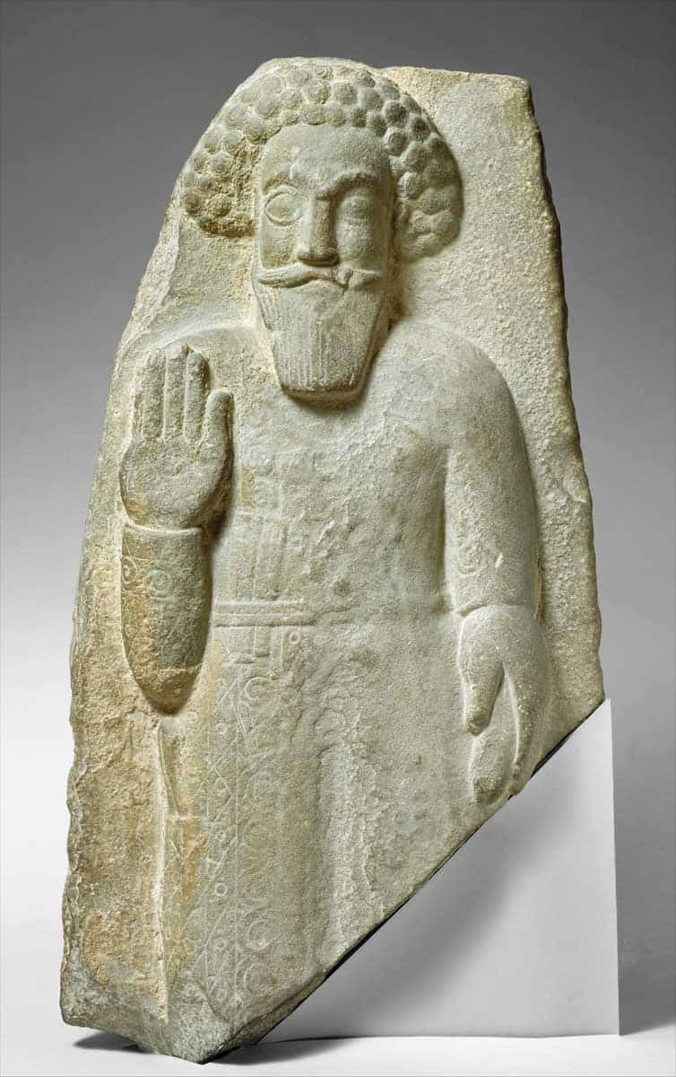 stone relief standing man