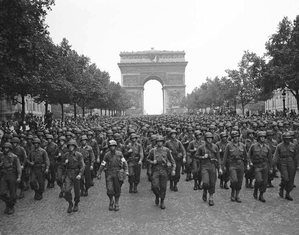 allied soldiers parade liberated paris d-day