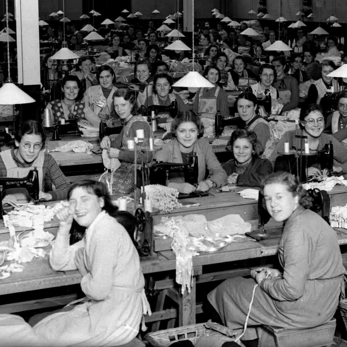 women sewing machines 1937 photo