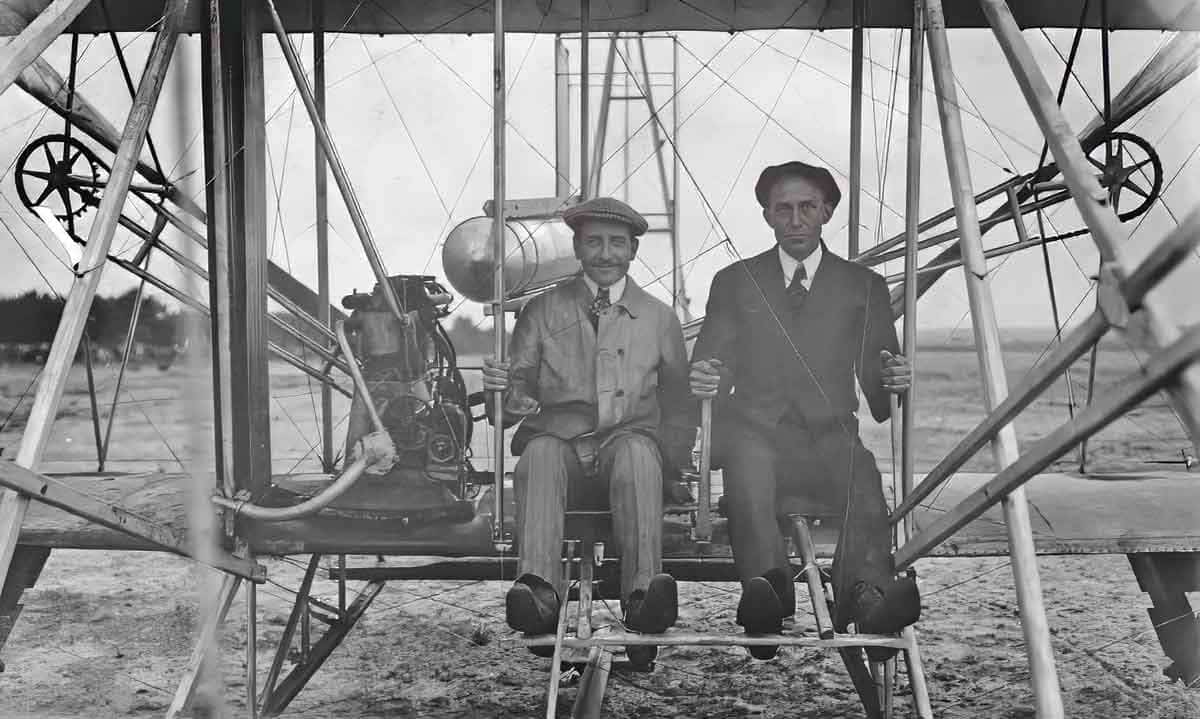 The Wright brothers in their plane