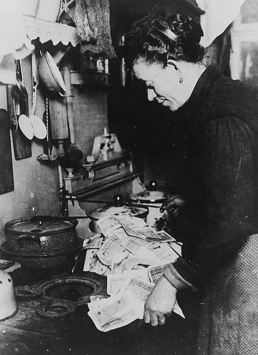 german woman burns devalued marks