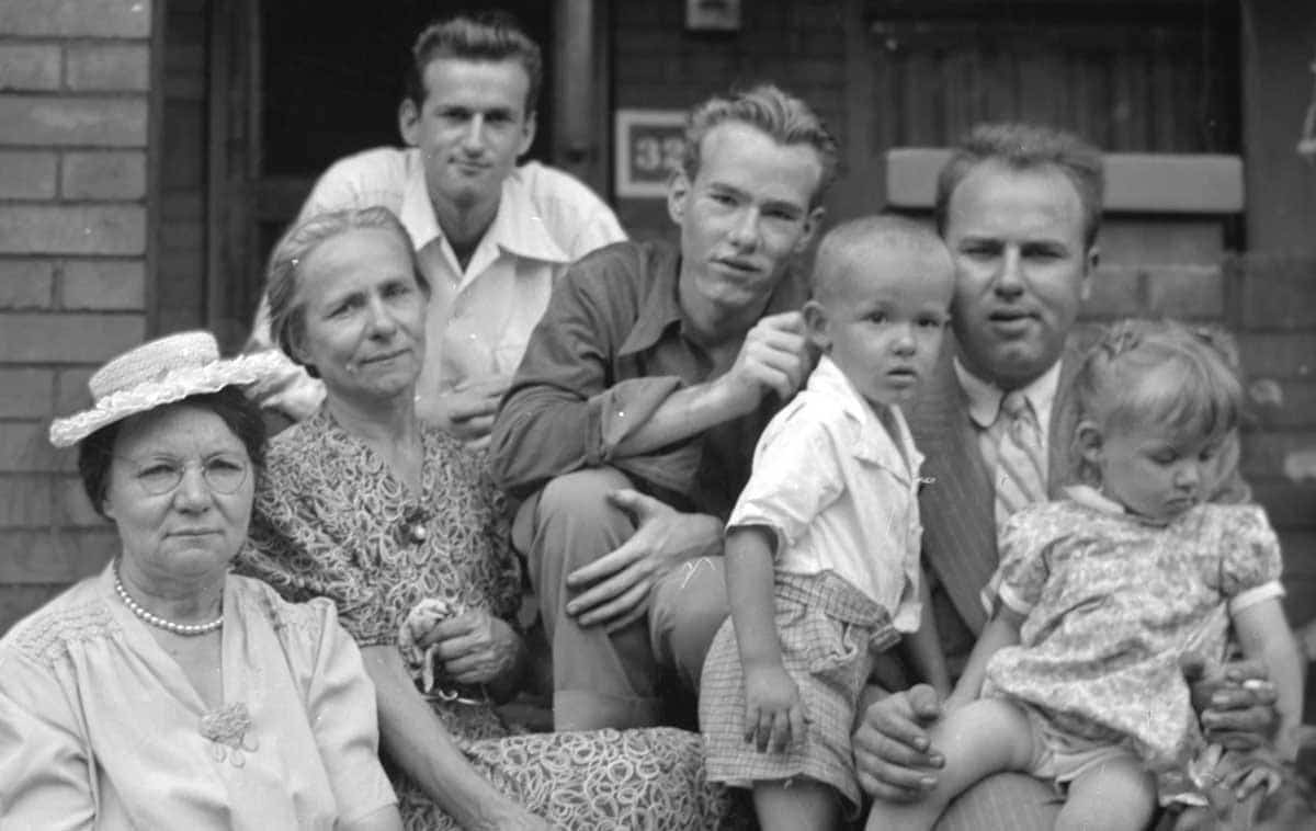 A teenage Andy Warhol (center) surrounded by his family in Pittsburgh, 1940s. Source: Grailed