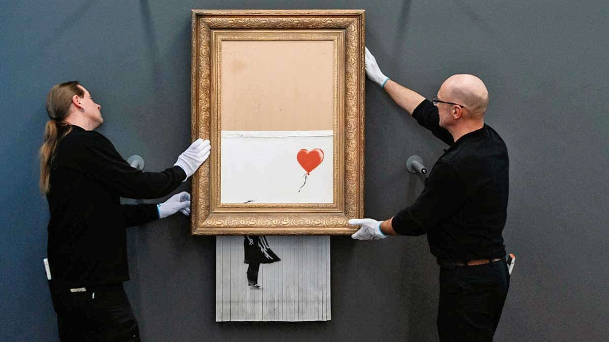 famous artist banksy balloon photo