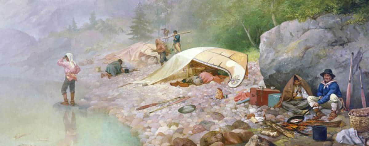 voyageurs at dawn canoes