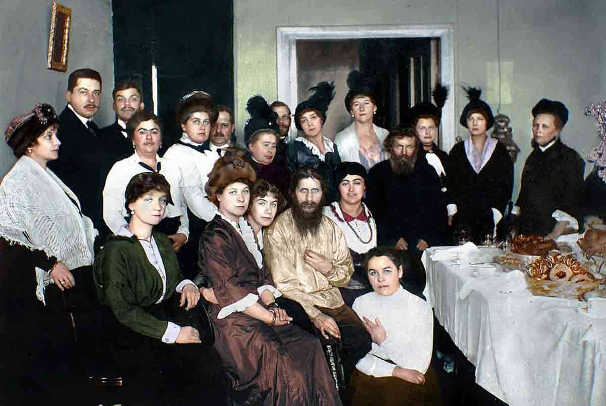 Rasputin (center) surrounded by his admirers, 1914. Source: Deviant Art