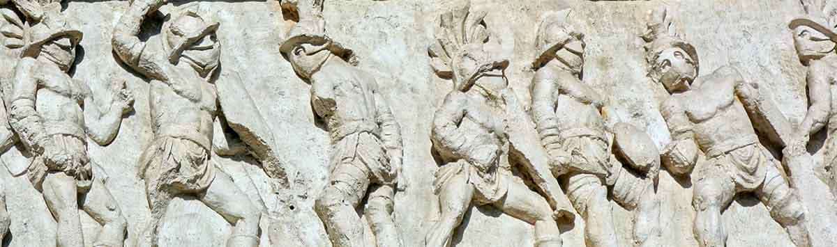 Relief imagery on the Colosseum of gladiators. Source: Wikimedia Commons